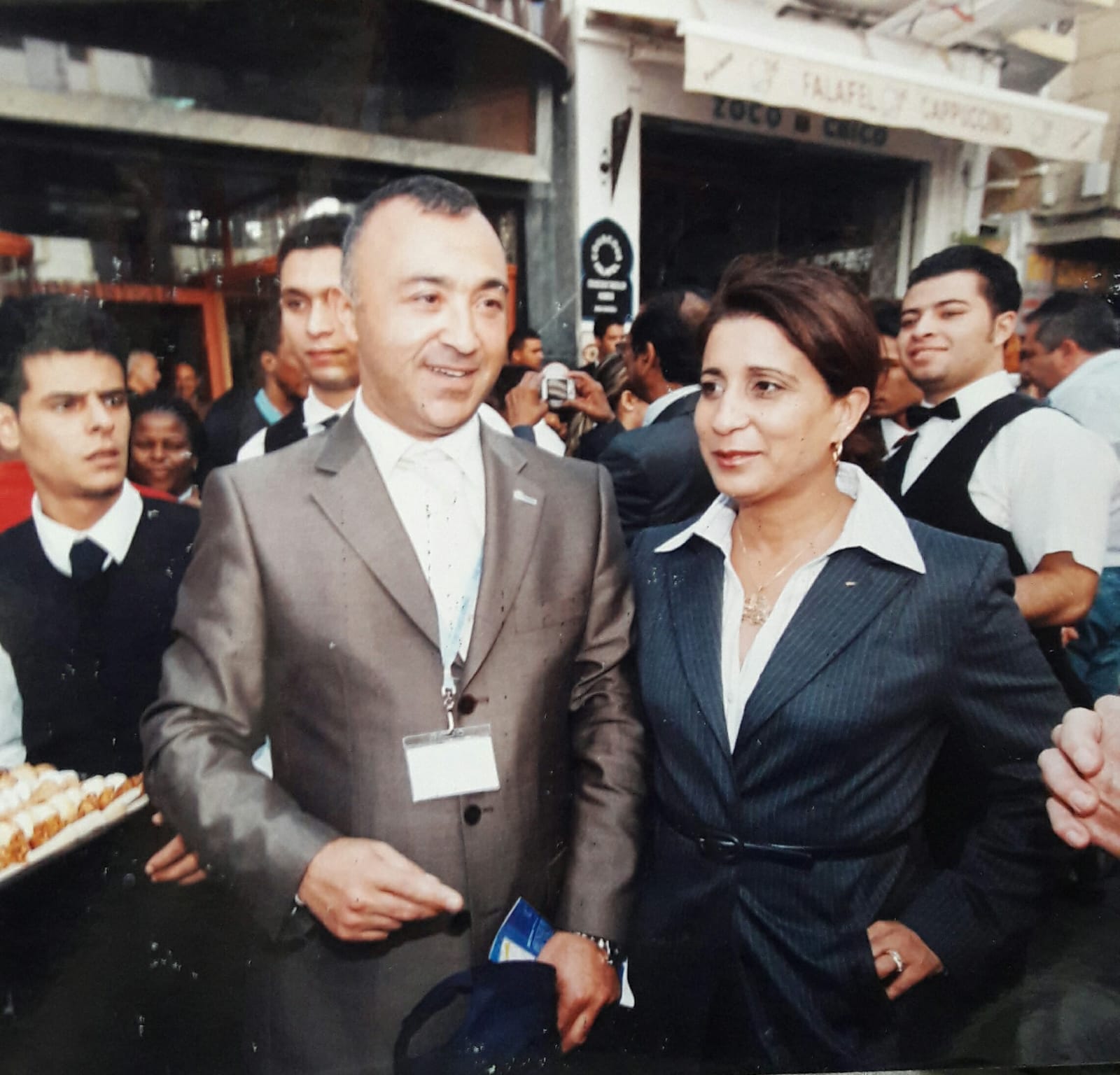 Hamid in formal attire at an official event