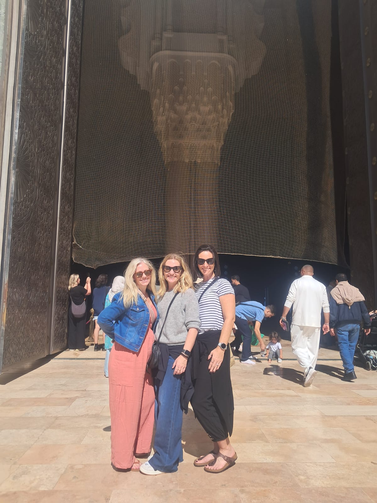 Tourists visiting a historical monument in Morocco