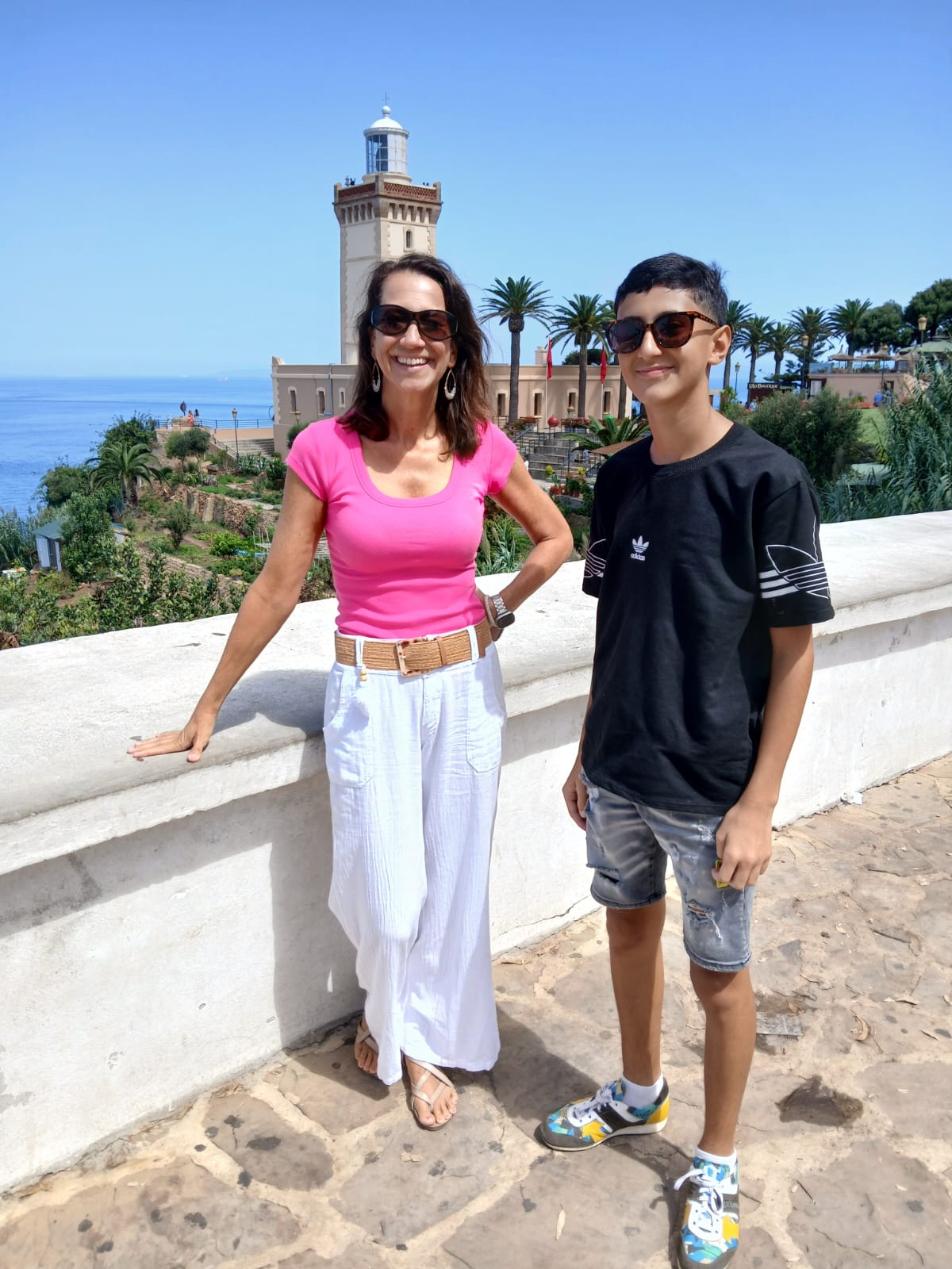 Family visit to the Cape Spartel lighthouse with ocean backdrop