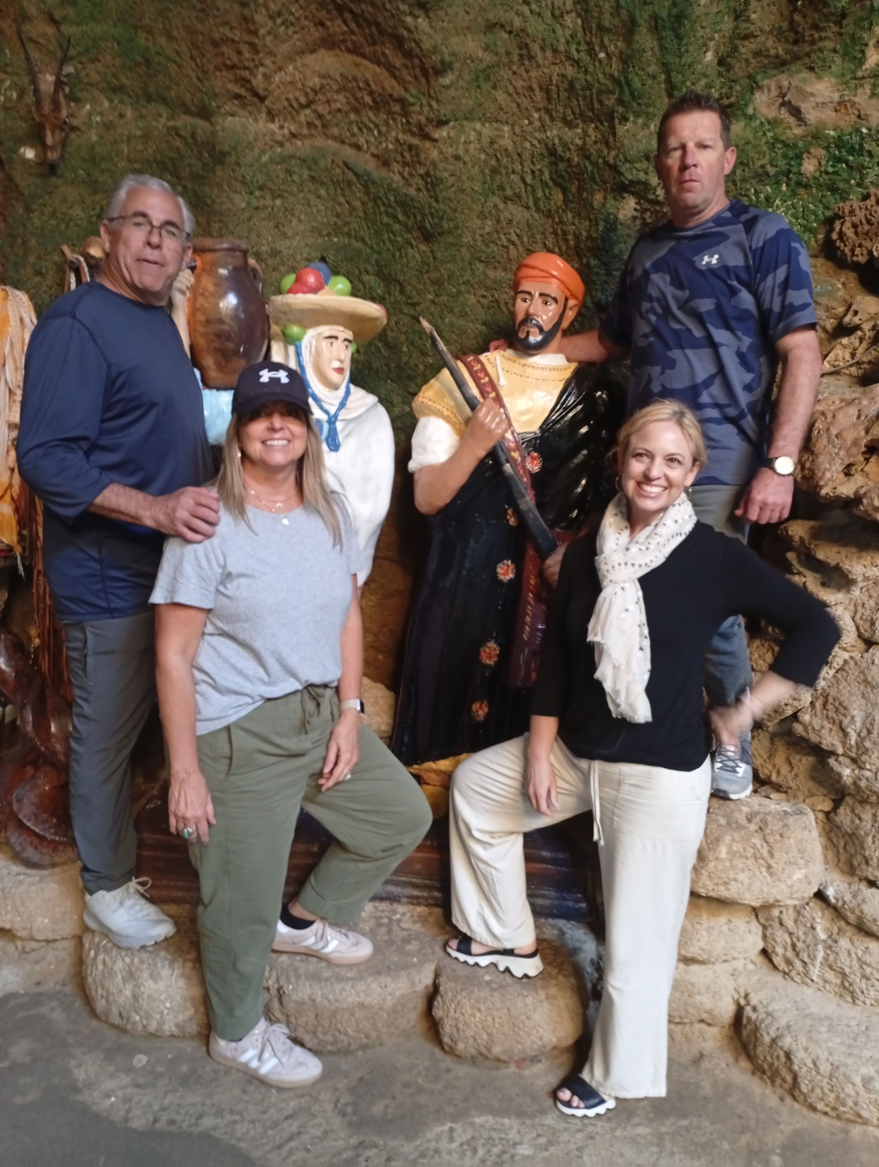 Tourists exploring a traditional Moroccan cave site