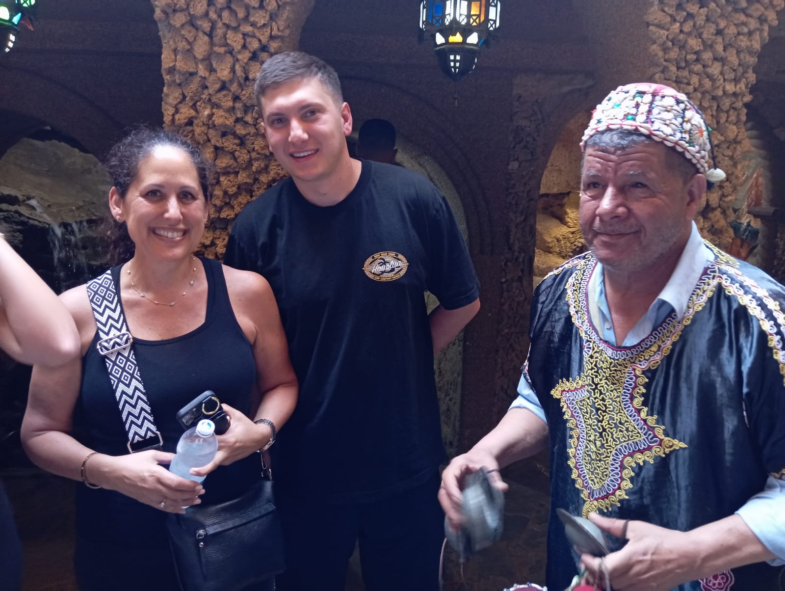 Tourists with a guide in traditional Moroccan attire